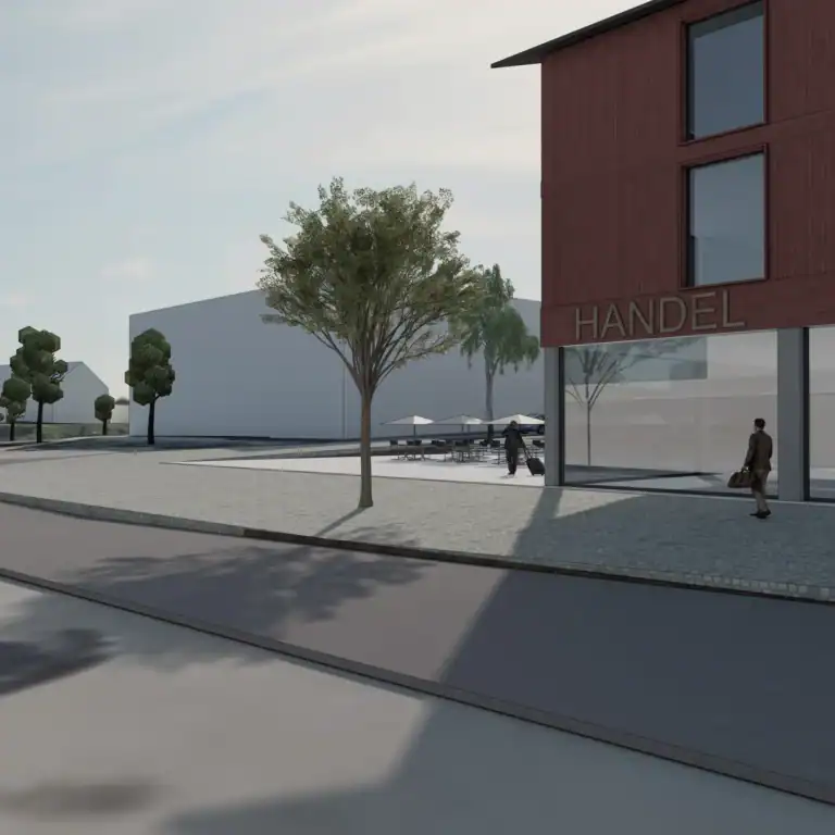 Modern commercial building exterior with retail space and outdoor seating area, featuring trees and urban design elements.